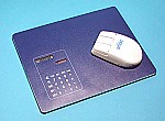 Mouse pad con calcolatrice di valuta.